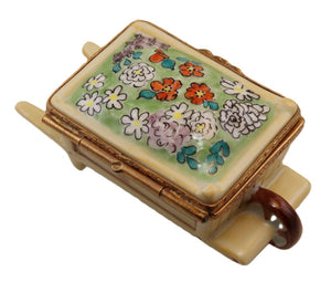 SKU# 6033 - Wheel Barrow Wood W/Flower